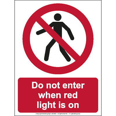 Do not enter when red light is on sign